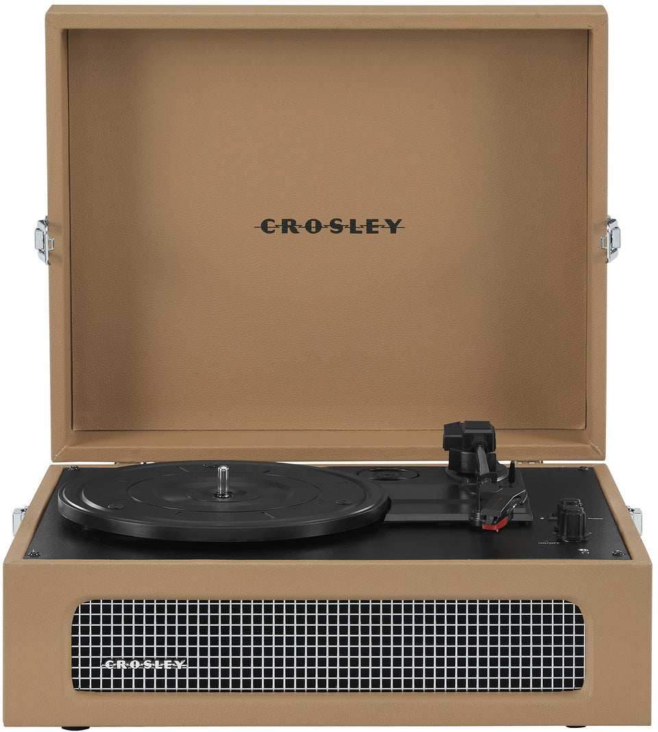 Crosley CR8017B-TA Voyager front view with tan cabinet and built-in speakers for quick listening.