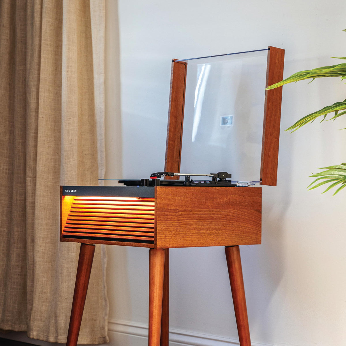 Mid-century slatted front design adds vintage charm
