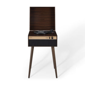 Crosley Jasper 3-speed turntable in walnut finish enhances living room ambiance and vinyl listening.