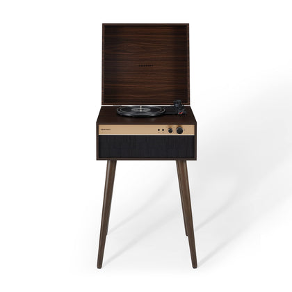 Crosley Jasper 3-speed turntable in walnut finish enhances living room ambiance and vinyl listening.