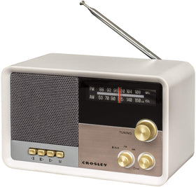 Crosley Tribute close-up of gold knobs highlighting tactile tuning and volume control benefits