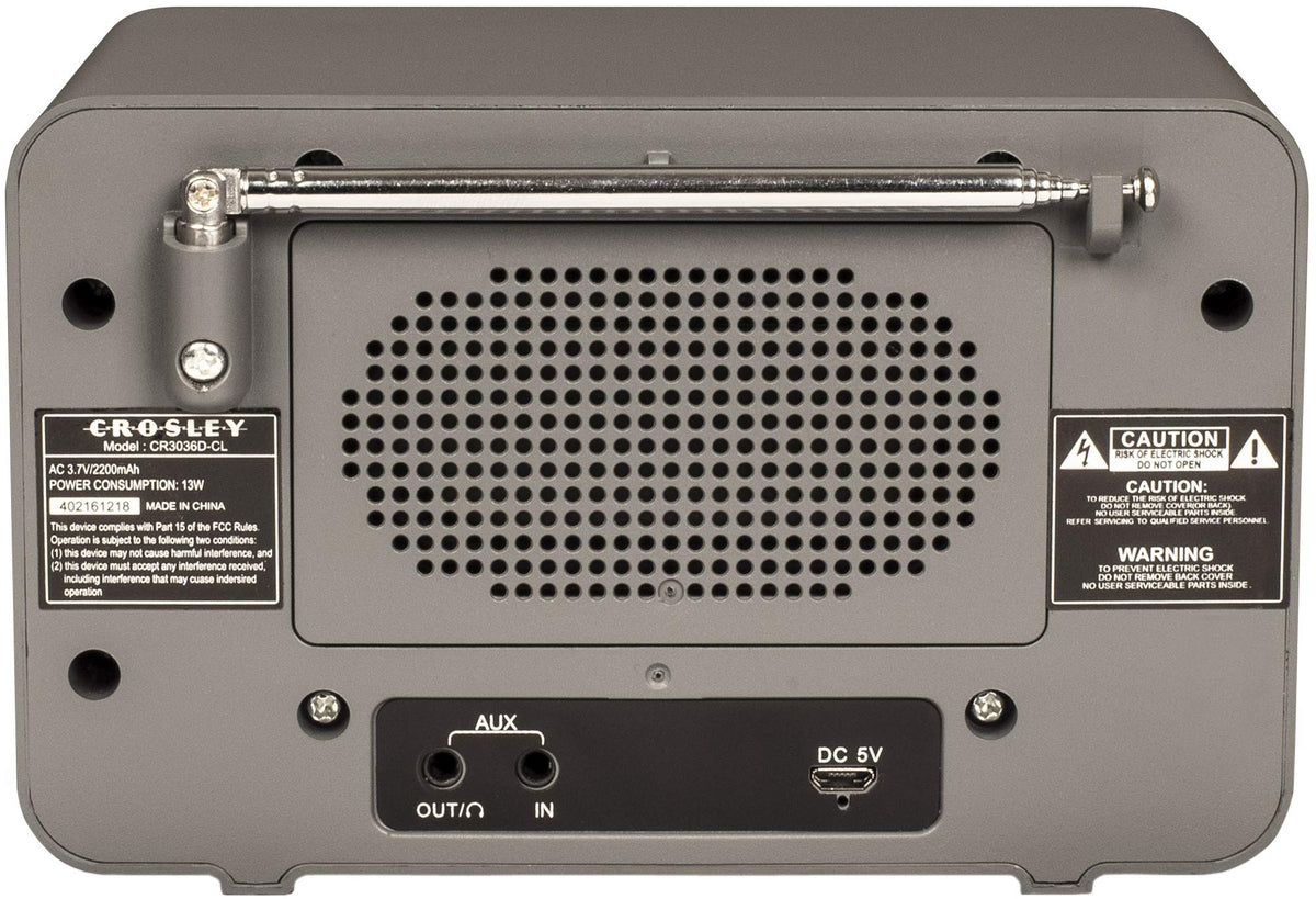 Crosley Tribute detail of headphone jack and aux port, enables private and wired listening