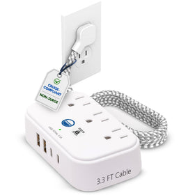 Cruise On cruise-approved power strip with USB ports on a cabin desk for easy charging.