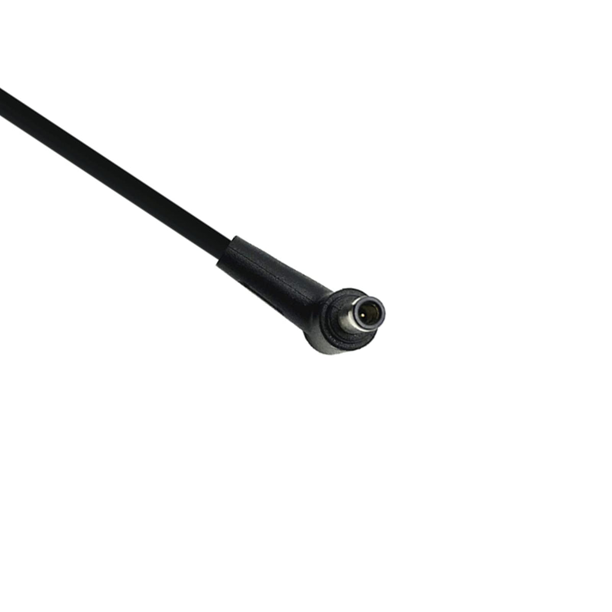 CRUMFERT adapter next to a laptop to show scale and portability benefit
