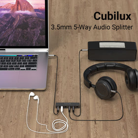 Cubilux 5-Way AUX splitter back view highlights solid aluminum housing for noise isolation.