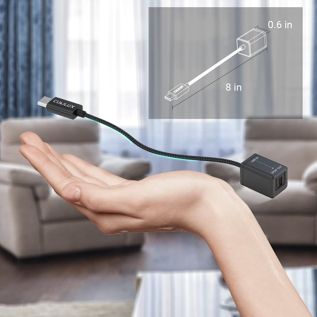 Cubilux packaging with included USB‑C cable and Toslink adapter
