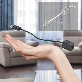 Cubilux packaging with included USB‑C cable and Toslink adapter