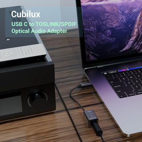 Cubilux in use with a soundbar demonstrates clean optical audio transmission
