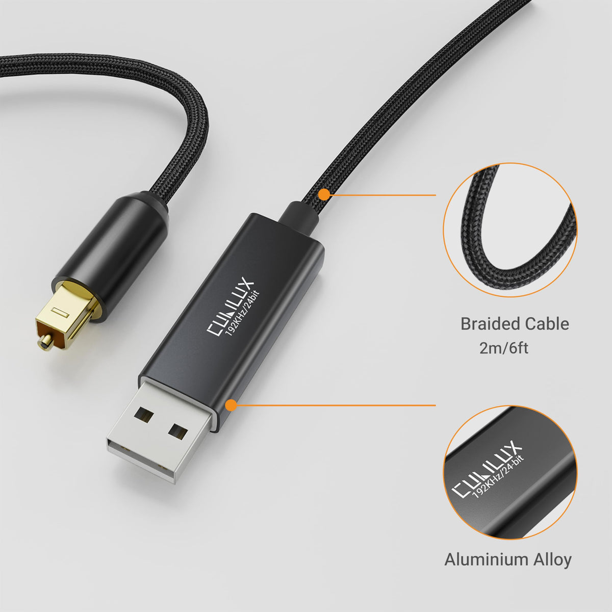 Cubilux USB-A to TOSLINK cable on a desk setup for PC/PS5