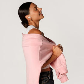 Cubitt Power Buds charging case open with earbuds inside showing long battery convenience