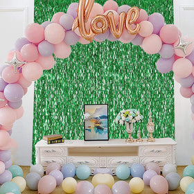 CYLMFC green foil backdrop enhances stage and door visuals.