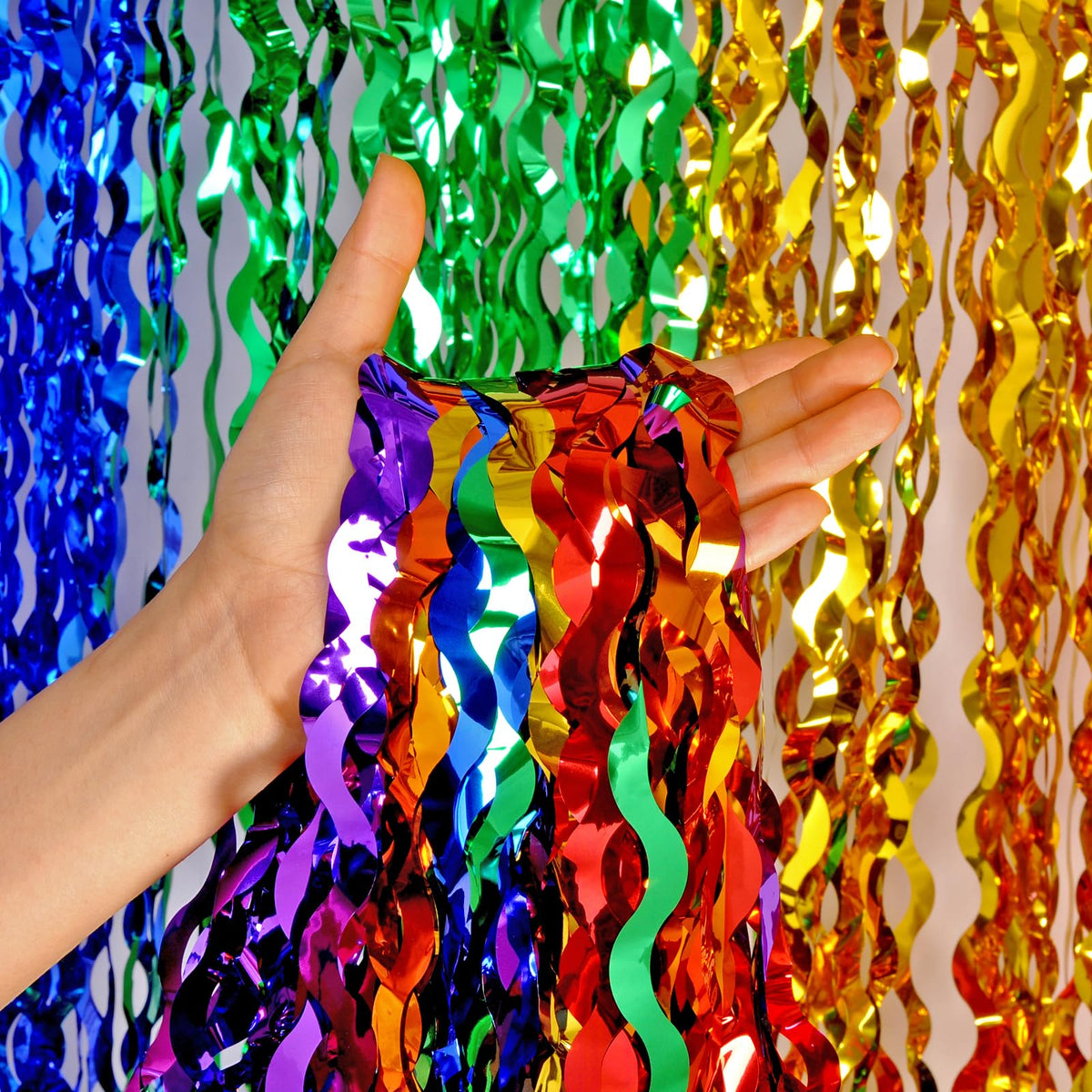 CYLMFC rainbow foil curtain backdrop for festive photo booth decor.