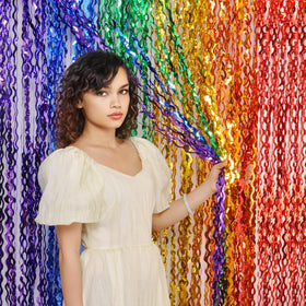 CYLMFC rainbow foil curtain photo booth backdrop boosts party vibes.