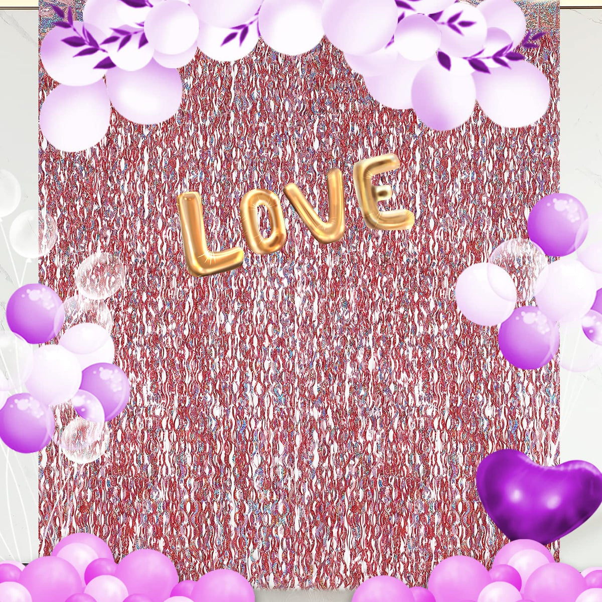 CYLMFC rose gold tinsel curtain layered for a thicker backdrop.