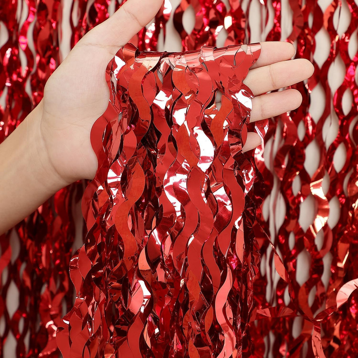 CYLMFC wavy red foil curtain adds shimmer to celebrations