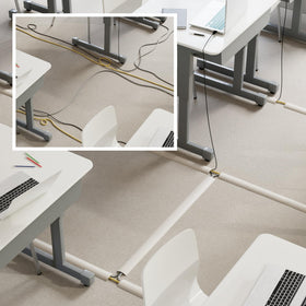 Beige D-Line cord cover can be cut to size with a utility knife.