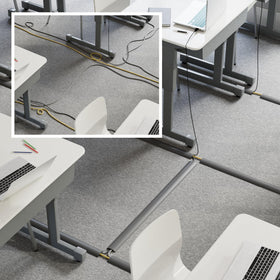 D-Line gray cord cover houses up to two cables for safe routing.