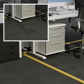 D-Line ribbed-base floor cord cover keeps cables secure and minimizes movement