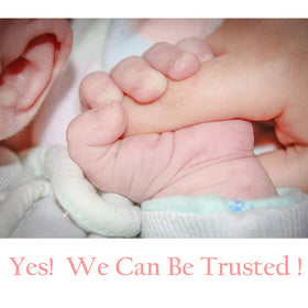 D.Vordingborg remote on couch arm while family watches TV for convenience