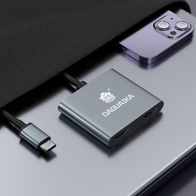 Daguaika dual-monitor workspace with USB-C hub.