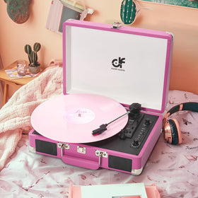DANFI AUDIO DF hot pink vinyl playback in a cozy living room setting