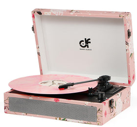 DANFI DF vinyl turntable in pink floral suitcase design showing portable setup for cozy listening