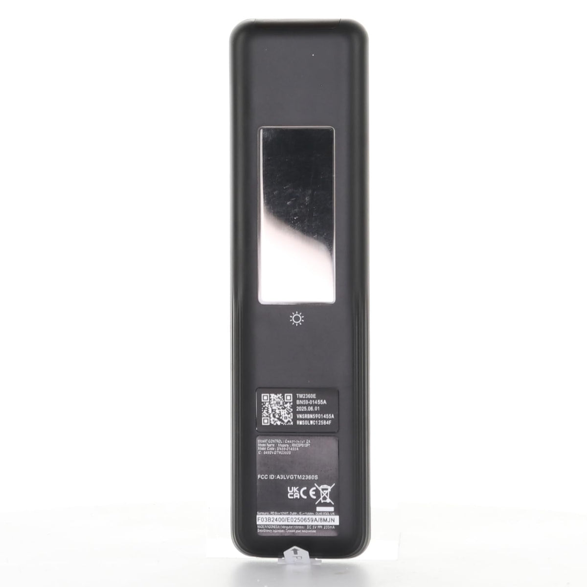 Dan's Originals remote in hand showing size and ergonomics, comfortable handling