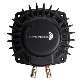 Dayton Audio BST-1 shaker on couch delivers immersive tactile bass.
