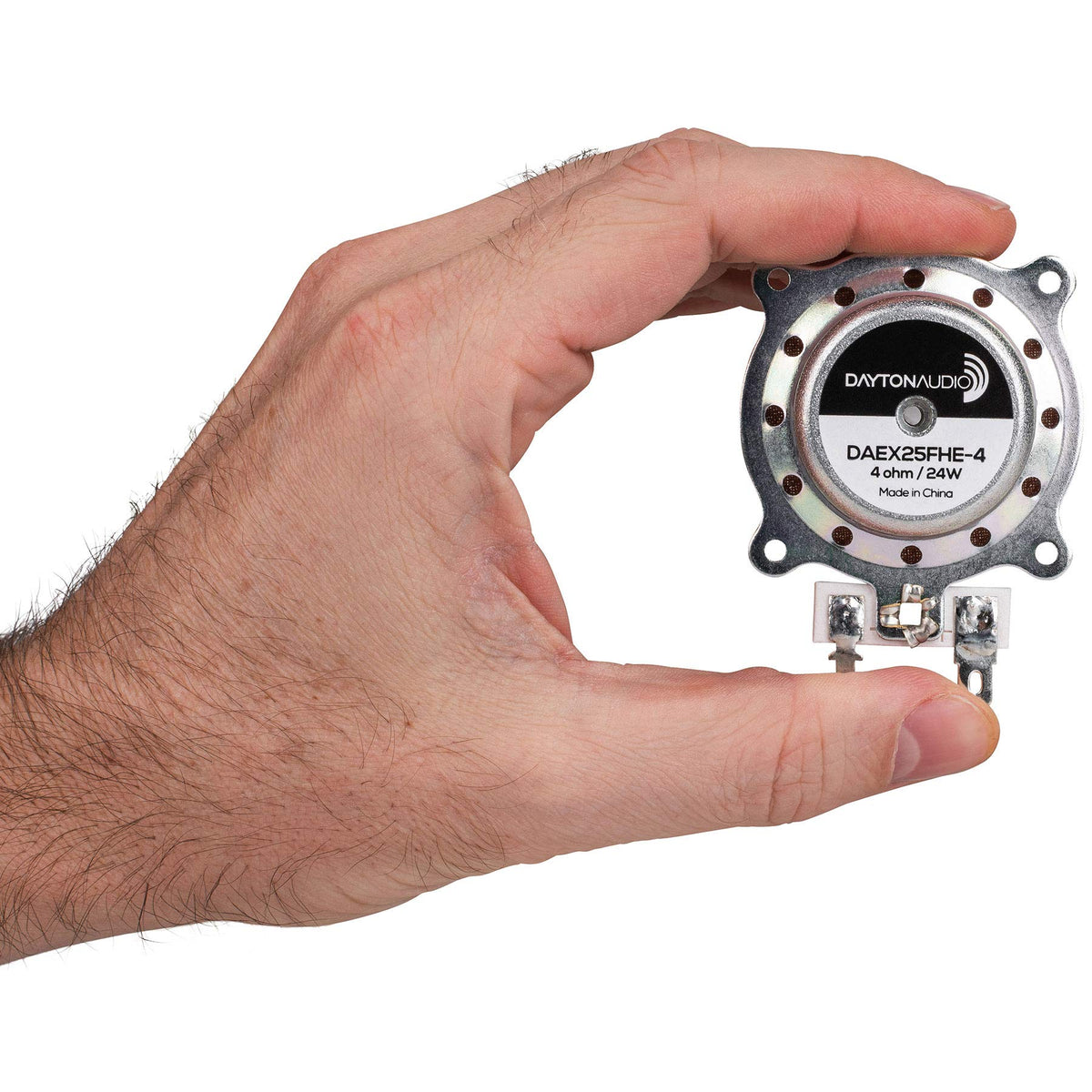Dayton Audio exciter scale next to coin showing small size benefits for tight spaces