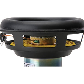 Dayton Audio ND105-4 held in hand for scale, illustrating compact high-excursion design