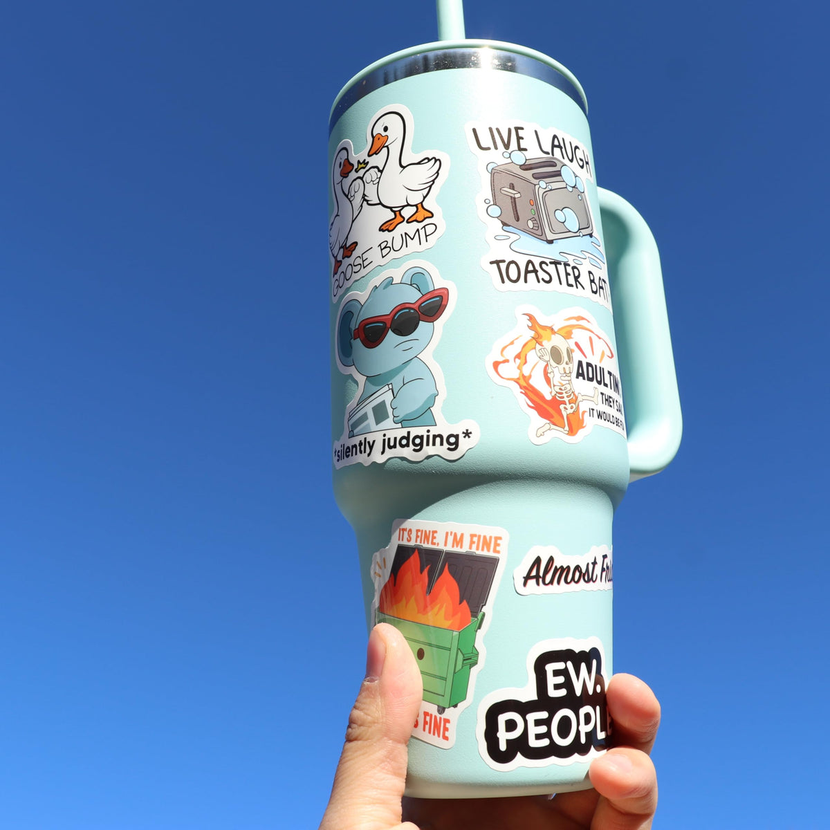 Debinolo laptop stickers brighten work devices with playful meme designs.