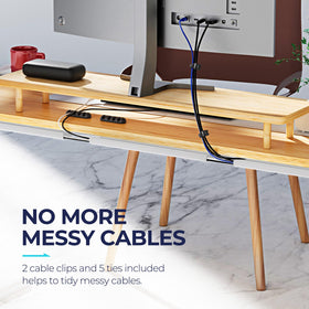 Delamu adhesive-back cable organizer on white desk surface, easy to install.