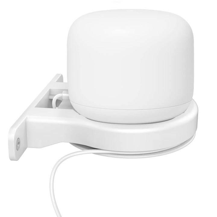 Delidigi front view holding Nest WiFi showing neat wall placement and improved desk space