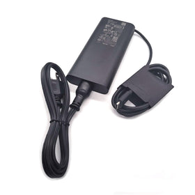 Dell 130W USB-C adapter side view, compact design for desk setups.