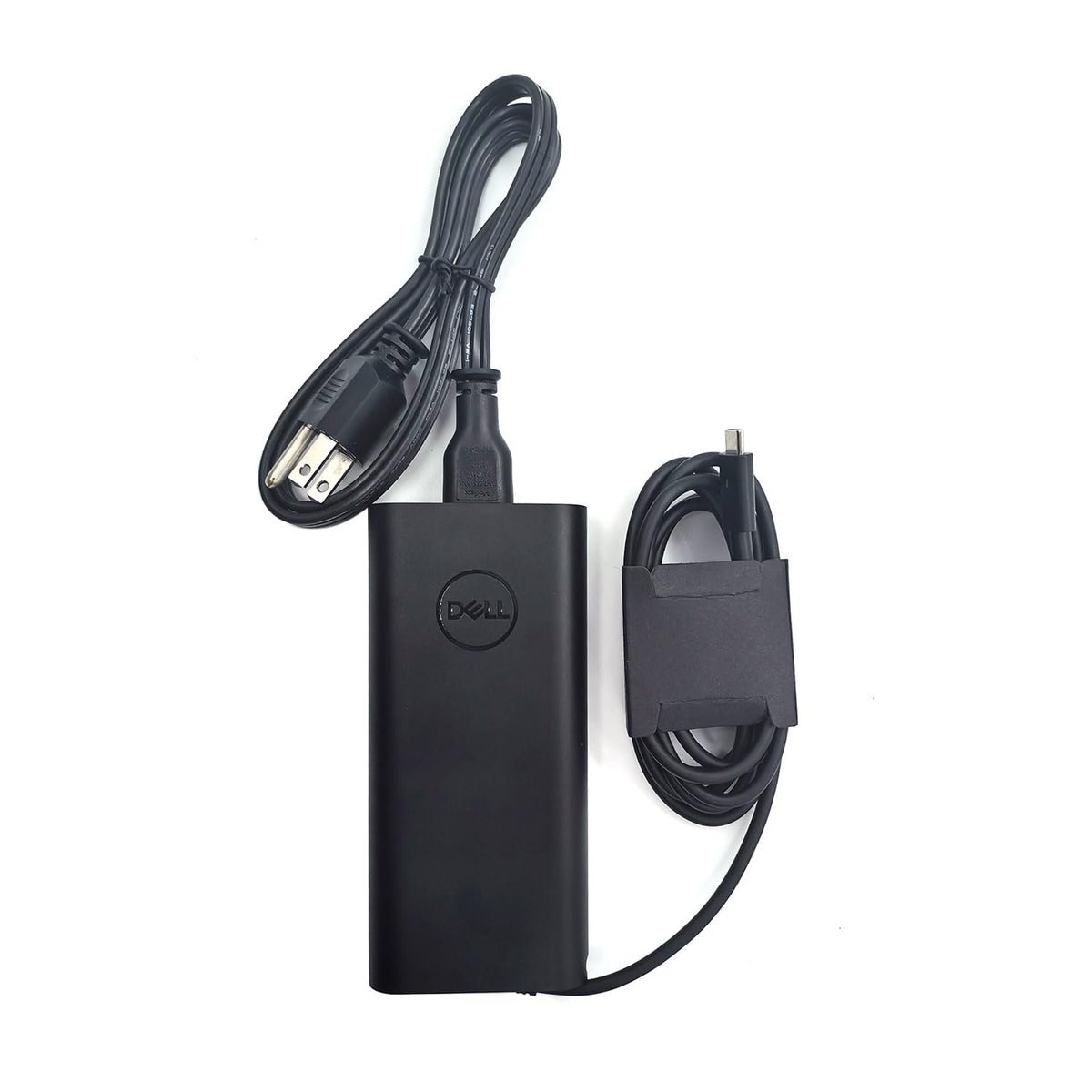 Dell 130W USB-C adapter tip closeup, USB-C connector for fast portable charging.