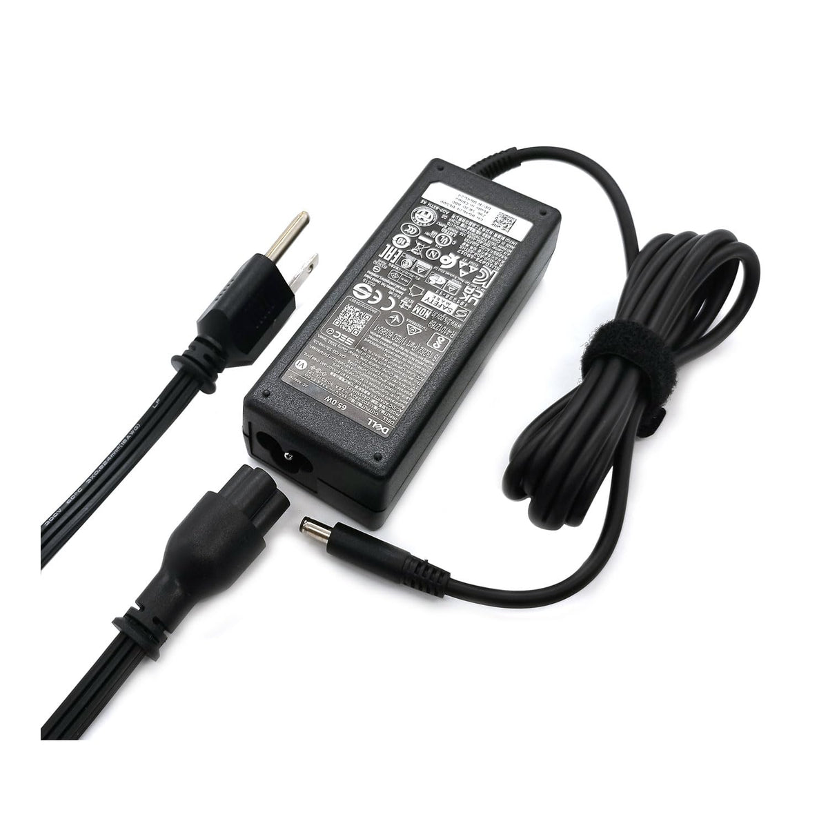 Dell laptop connected to the 65W charger, demonstrating compatibility