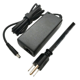 Dell in-use image demonstrates practical charging while working away from a desk.