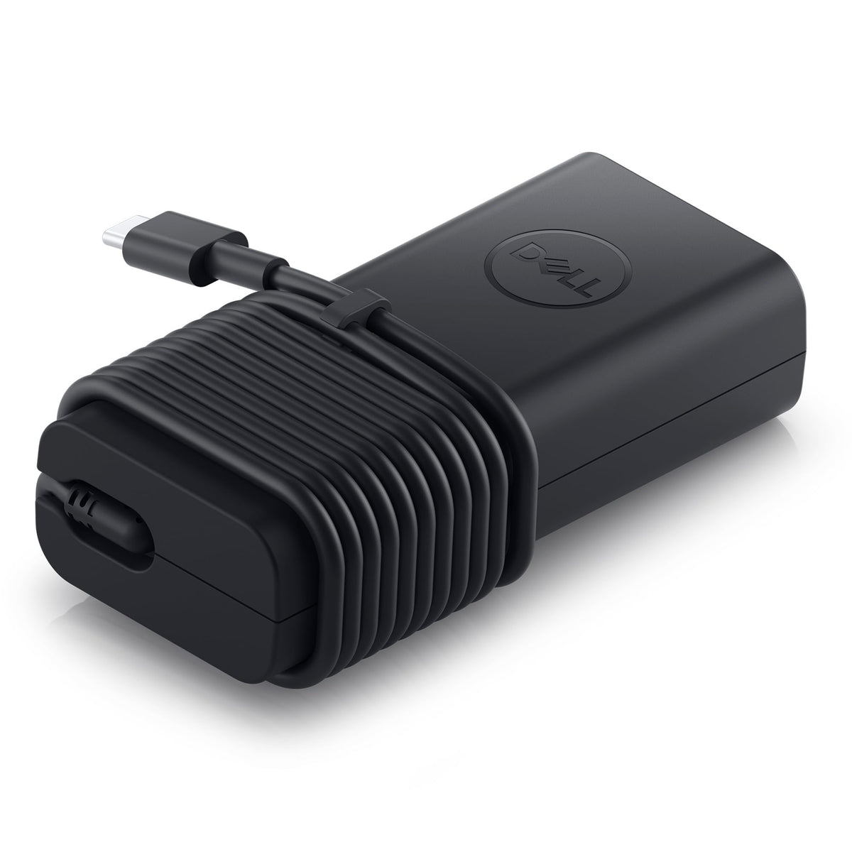 Dell 65W USB-C adapter with 1m cable, back view, organized charging setup.