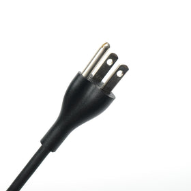 Dell USB-C charger with 3ft cord coiled for easy reach
