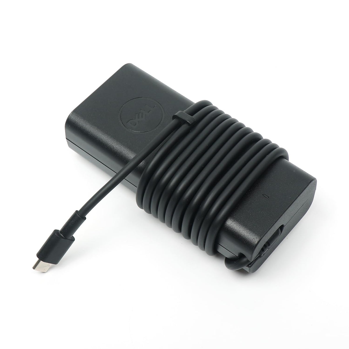 Dell 65W USB-C Charger side view, compact for travel and easy packing.