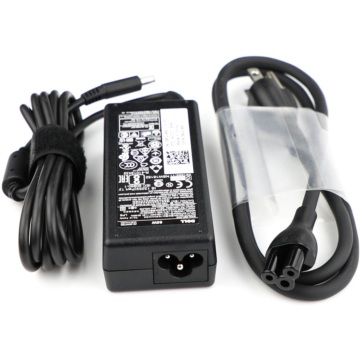 Dell 65W adapter with cable and plug positioned for easy desk setup