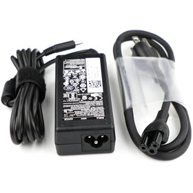 Dell 65W adapter with cable and plug positioned for easy desk setup
