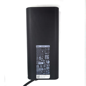 Dell adapter with box and cord showing ready-to-use genuine parts