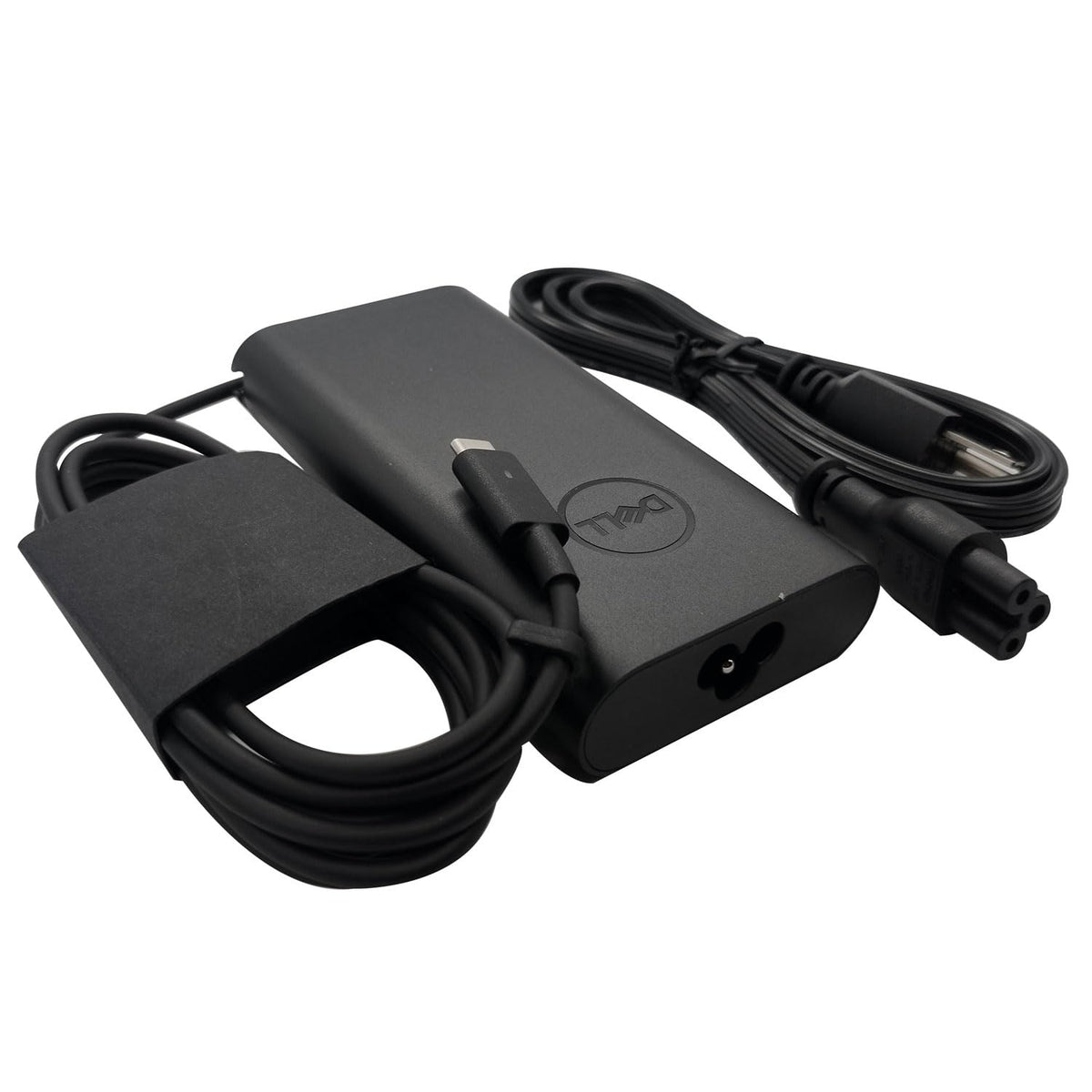 Dell adapter plug and port detail emphasizing durable construction and safety