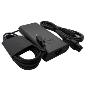 Dell adapter plug and port detail emphasizing durable construction and safety