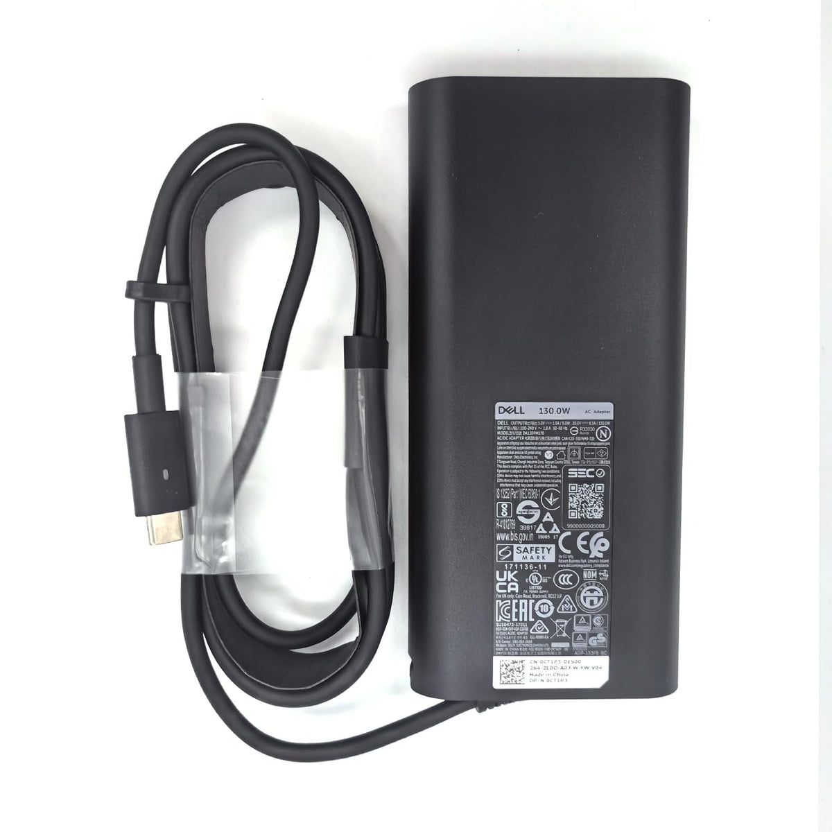 Dell packaging and included cord showing everything supplied for use