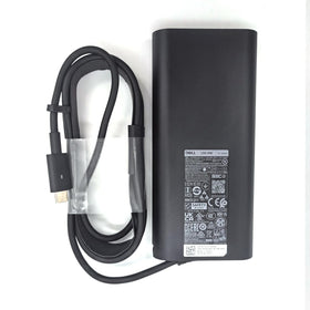 Dell packaging and included cord showing everything supplied for use