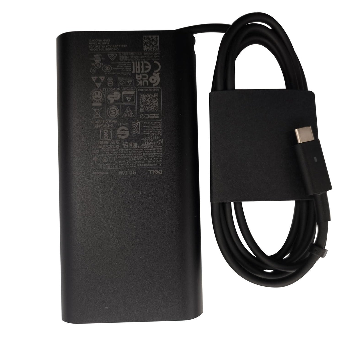 Dell adapter charging a laptop in a workspace to show real‑world convenience