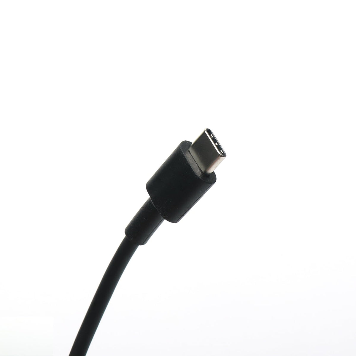 Dell Latitude 7450 on desk using 65W charger for steady power