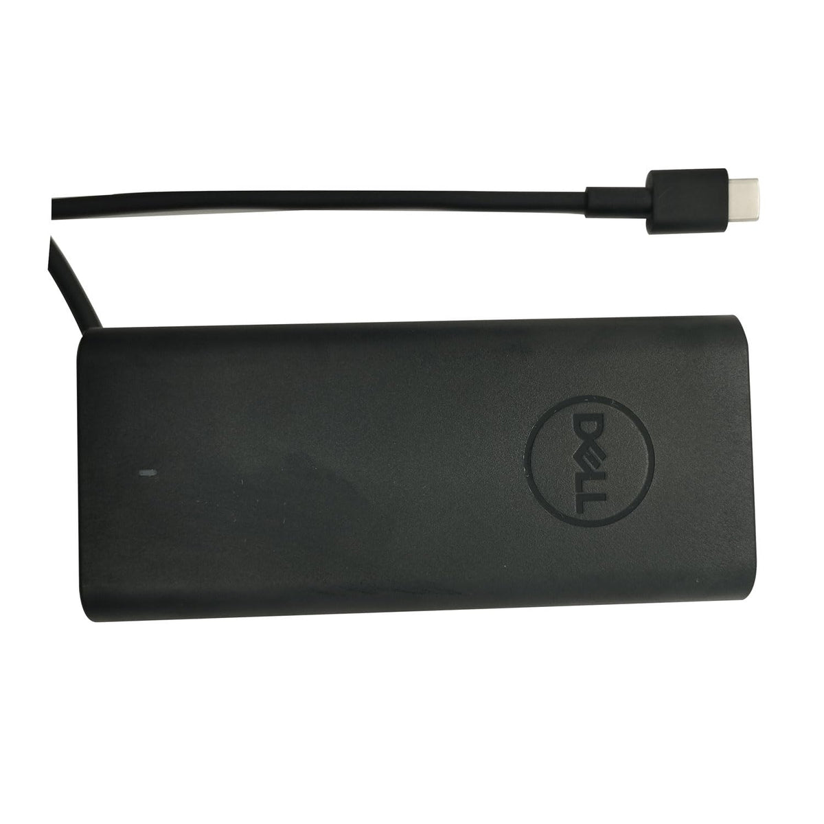 New genuine Dell adapter packaging emphasizes authenticity.